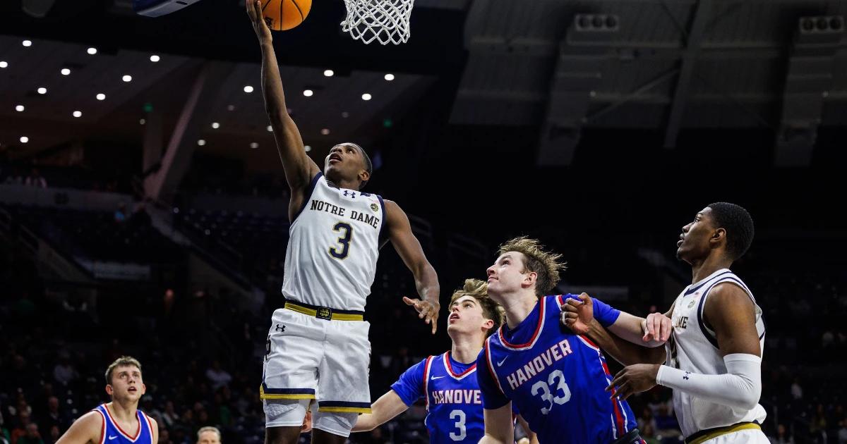 Markus Burton finishing a layup against Hanover.